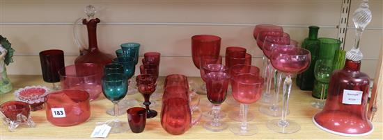 A twenty eight piece collection of Victorian and later cranberry glassware and five green bowled wine glasses and other green glass